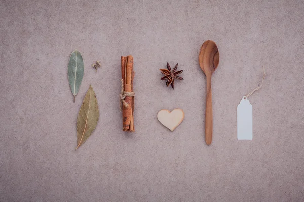 Wooden spoon ,cinnamon ,star anise ,wooden heart — Zdjęcie stockowe