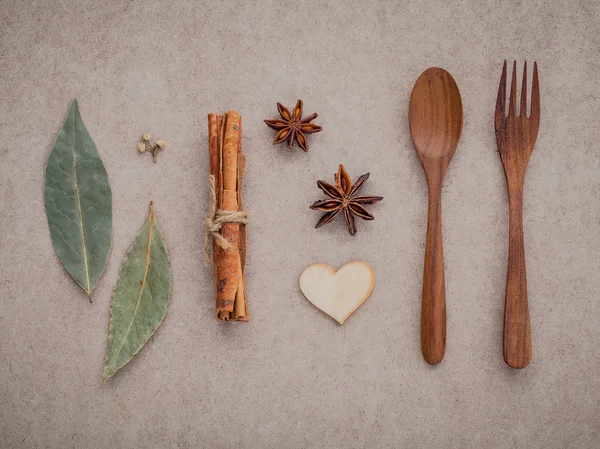 Wooden spoon ,fork ,cinnamon ,star anise ,wooden heart — Zdjęcie stockowe