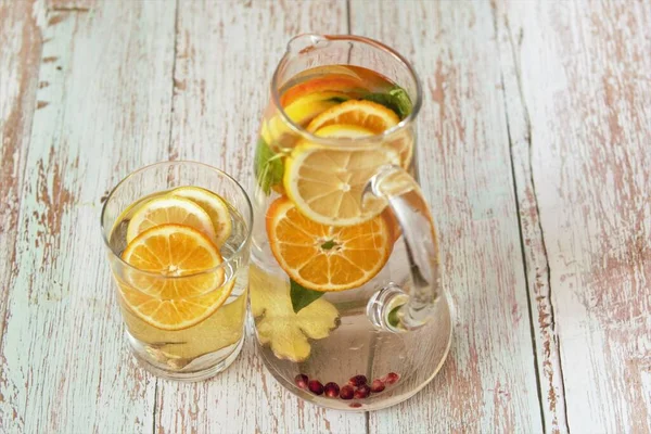 Water Teapot Glass Lemon Wedges Tangerine Mint Leaves Ginger Root — Stock Photo, Image