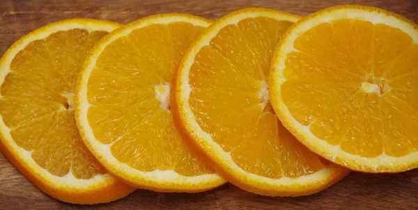 Fatias redondas de laranja — Fotografia de Stock