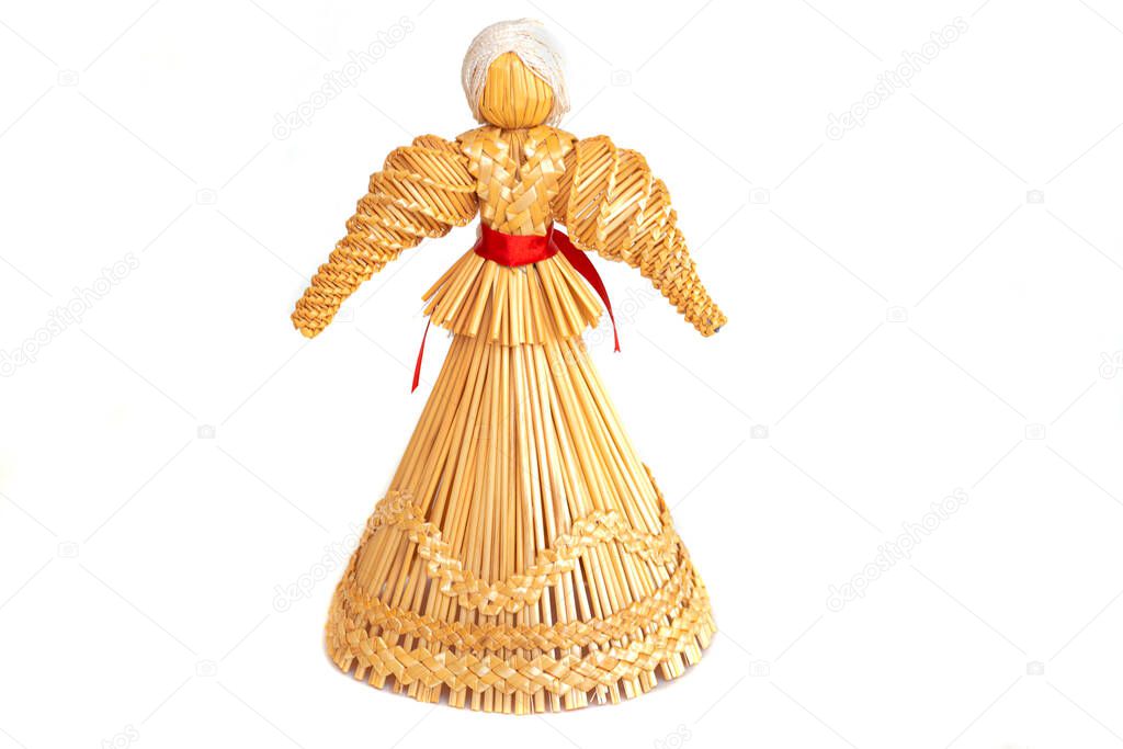 Straw doll traditional toy of the Slovenian countries on a white isolated background. Symbol of Shrovetide