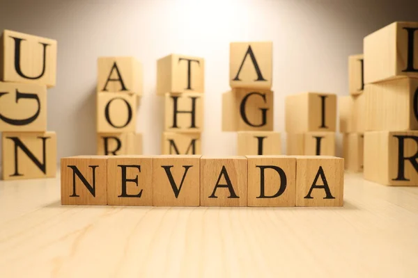 Word Nevada Created Wooden Letter Cubes Cities Words Close — Stock Photo, Image