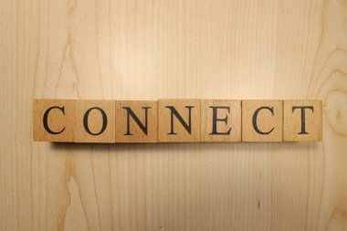 Bağlantı kelimesi tahta harf küplerinden yaratıldı. İletişim ve ağ kurma. Kapat..