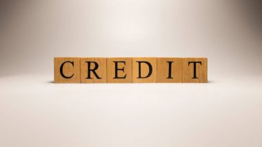 Kredi adı ahşap harf küplerinden yaratıldı. Ekonomi ve finans. Kapat..