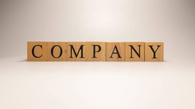 Şirketin adı ahşap harf küplerinden yaratıldı. Ekonomi ve Finans. Kapat..