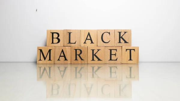 El nombre Mercado Negro fue creado a partir de cubos de letras de madera. financiación e ilegal. — Foto de Stock