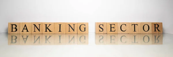 The name Sector Banking was created from wooden letter cubes.