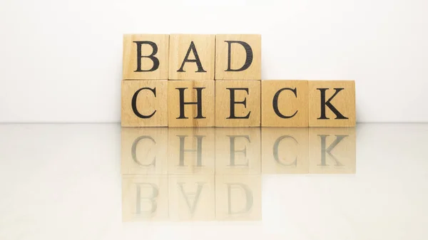 Naam Bad Check Gemaakt Van Houten Letterblokjes Financiën Economie Close — Stockfoto