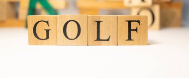 Golf sport was created from wooden cubes. Sports and the Olympics. close up.