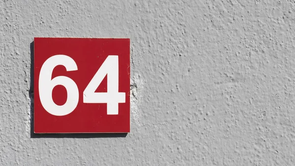 Red Sign Number Gray Wall Close — Stock Photo, Image