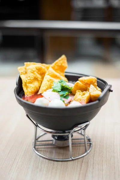 Noodle soup in clay pot — Stock Photo, Image