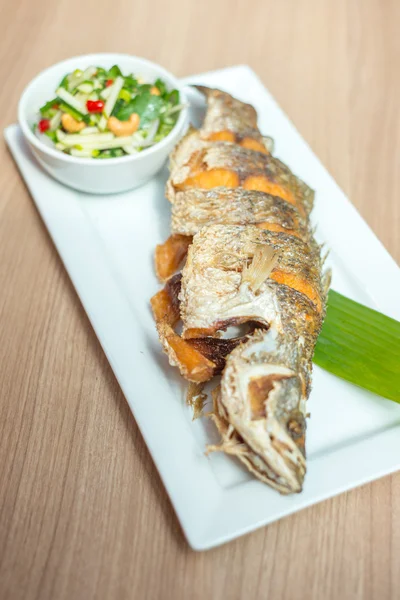 Deep fried fish with Thai salad. — Stok fotoğraf