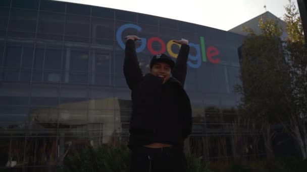 Asian Young Man Jumping Joy Front Google Office Google Googleplex — Stock Video