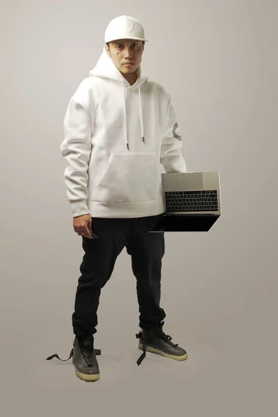 Portrait Stylish Asian Man Holding Opened Laptop Isolated White — Foto Stock