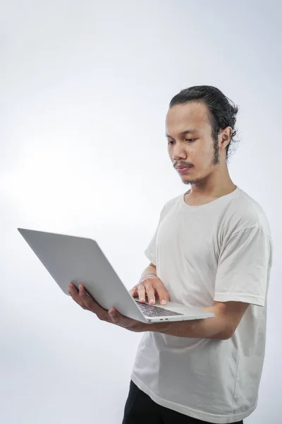 Portrait Young Man Holding Laptop Computer Isolated White — Fotografia de Stock