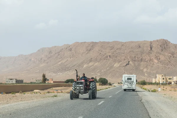 The farmar rides truck by in opposite directions with recreation — Stock Photo, Image