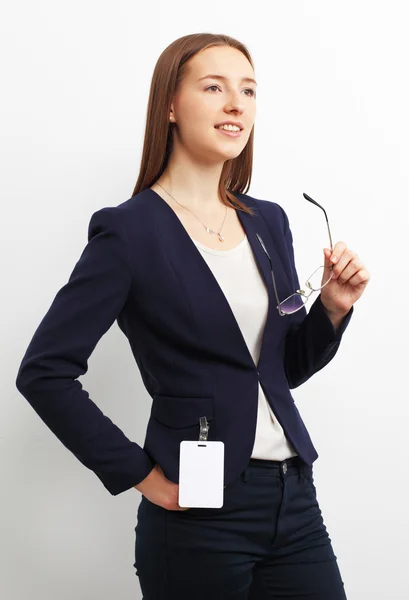 Portrait of happy young business woman with glasses over white b — Stock Photo, Image