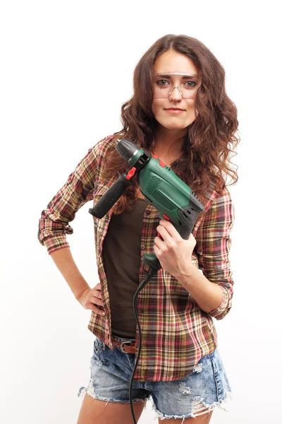 Image of smiling woman with drill over white background — Stock Photo, Image