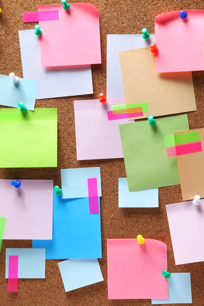 Image of colorful sticky notes on cork bulletin board — Stock Photo, Image