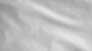 Rüzgarda sallanan boş beyaz bayrak. Teslim olma sembolü yumuşak ve pürüzsüz ipek. Kumaş kumaş dokusu Asteğmen arkaplan.