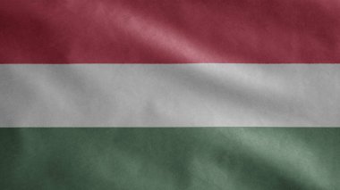 Rüzgarda sallanan Macar bayrağı. Macaristan bayrağını yakın çekin, yumuşak ve pürüzsüz ipek. Kumaş kumaş dokusu Asteğmen arkaplan.