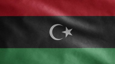 Libya bayrağı rüzgarda dalgalanıyor. Libya bayrağını yakın çekin, yumuşak ve pürüzsüz ipek. Kumaş kumaş dokusu, Asteğmen. Ulusal gün ve ülke etkinlikleri konsepti için kullan..