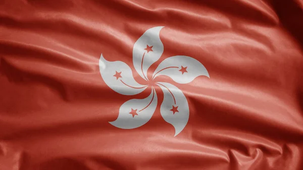 Hongkong flag waving in the wind. Close up of Hong Kong banner blowing, soft and smooth silk. Cloth fabric texture ensign background.