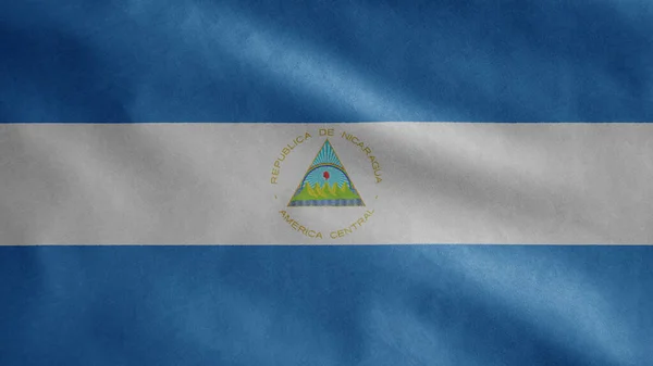 니카라과의 국기가 바람에 흔들리고 있습니다 니카라과 현수막의 부드럽고 명주실 구조는 — 스톡 사진