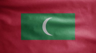 Rüzgarda dalgalanan Maldivler bayrağı. Maldivler 'in afişini yakın çekin, yumuşak ve pürüzsüz ipek. Kumaş kumaş dokusu Asteğmen arkaplan.
