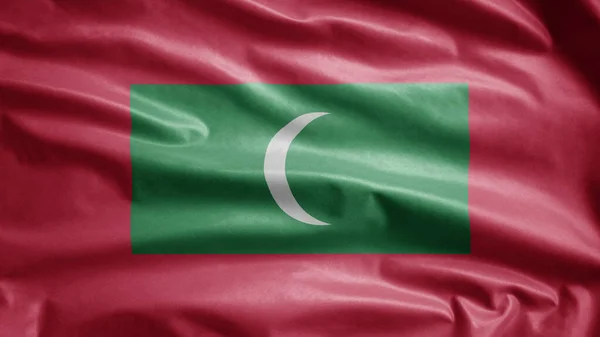 马尔代夫的国旗在风中飘扬 靠近马尔代夫的旗帜飘扬 柔滑的丝绸 布料质地为背景图案 将其用于国庆日和国庆日概念 — 图库照片