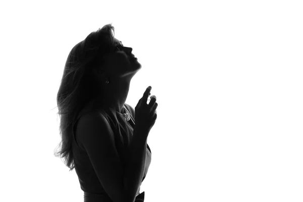 Portrait of a young woman with bottle of perfume — Stock Photo, Image