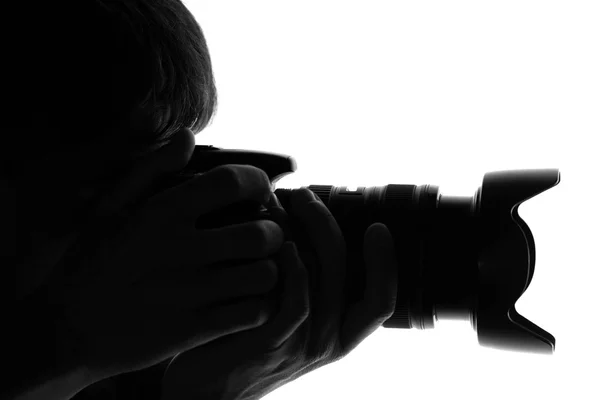 Silhouette of a man with a camera — Stock Photo, Image