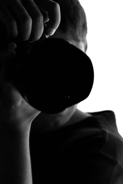 Silhouette of a man with a camera — Stock Photo, Image