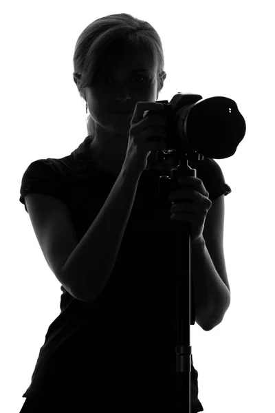 Silueta ženy s kamerou — Stock fotografie