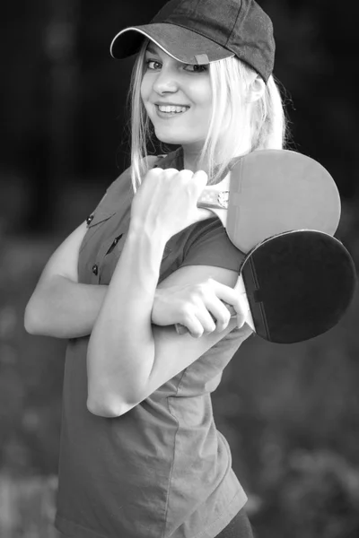 Portrait of a woman with tennis racket — Stock Photo, Image
