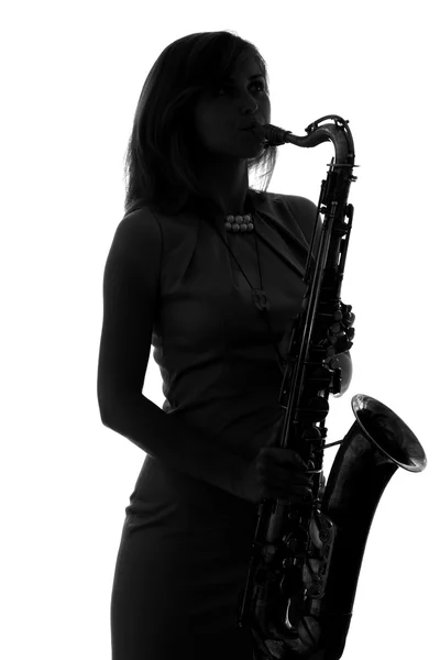 Mujer joven tocando el saxofón —  Fotos de Stock