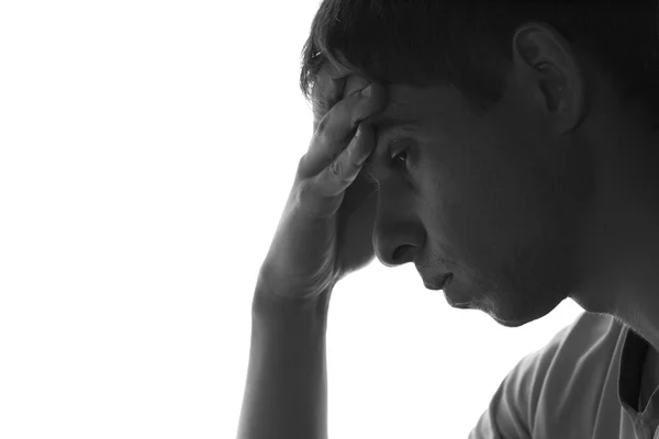 Silueta del hombre triste sobre un fondo blanco — Foto de Stock