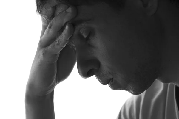 Silueta del hombre triste sobre un fondo blanco — Foto de Stock