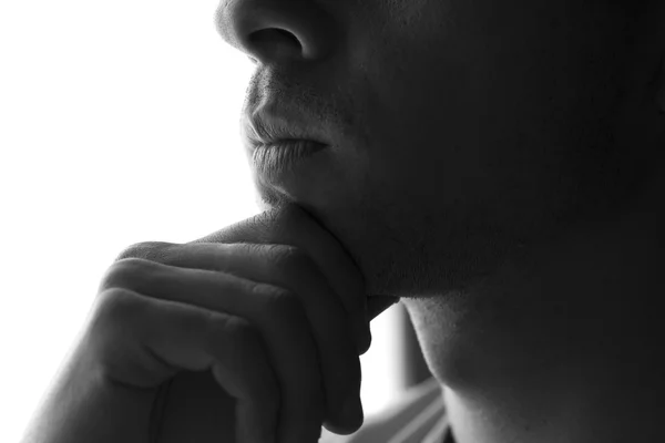 Verdrietig man silhouet op een witte achtergrond — Stockfoto