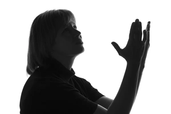 Silueta en blanco y negro de una mujer con la última esperanza clamando a Dios —  Fotos de Stock