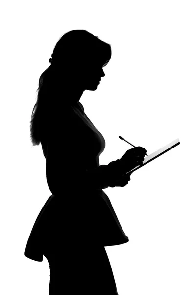 Silhouette de jeune femme d'affaires signant un contrat d'affaires — Photo