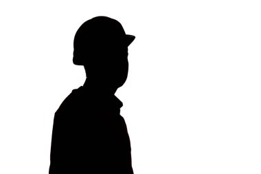 Beyaz yalıtılmış arka plan, erkek mesleği kavramı üzerine sert şapkalı genç müteahhit silueti.