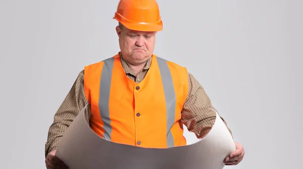Satisfied Engineer Hard Hat Looking Expanded Paper Project Hands Grey — Stockfoto