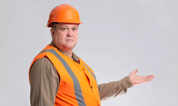 Middle Aged Contruction Worker Orange Helmet Holding Smth Hand Grey — Foto Stock