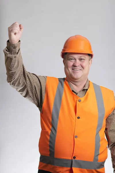 Successful Construction Worker Hard Hat Showing Thumb Grey Studio Background — Fotografia de Stock