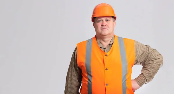 Serious Stout Construction Worker Helmet Grey Studio Background Foreman Managing — Stock Photo, Image