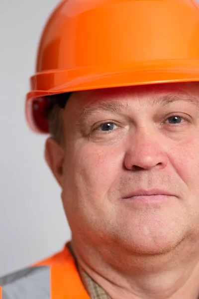 Happy Middle Aged Construction Worker Orange Hardhat Grey Studio Background — Foto Stock