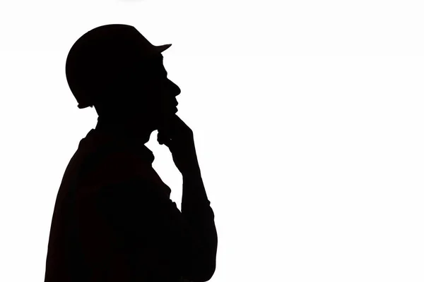 Düşünen Mühendis Kafa Profili Çenesinin Altında Silueti Beyaz Şapkalı Inşaat — Stok fotoğraf