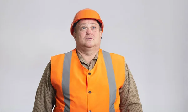 Fat Construction Worker Funny Confusion Helmet Reflective Vest Grey Background — Stock Photo, Image