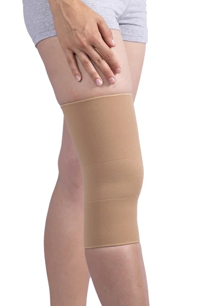 Knee bandage on the leg of young woman — Stock Photo, Image